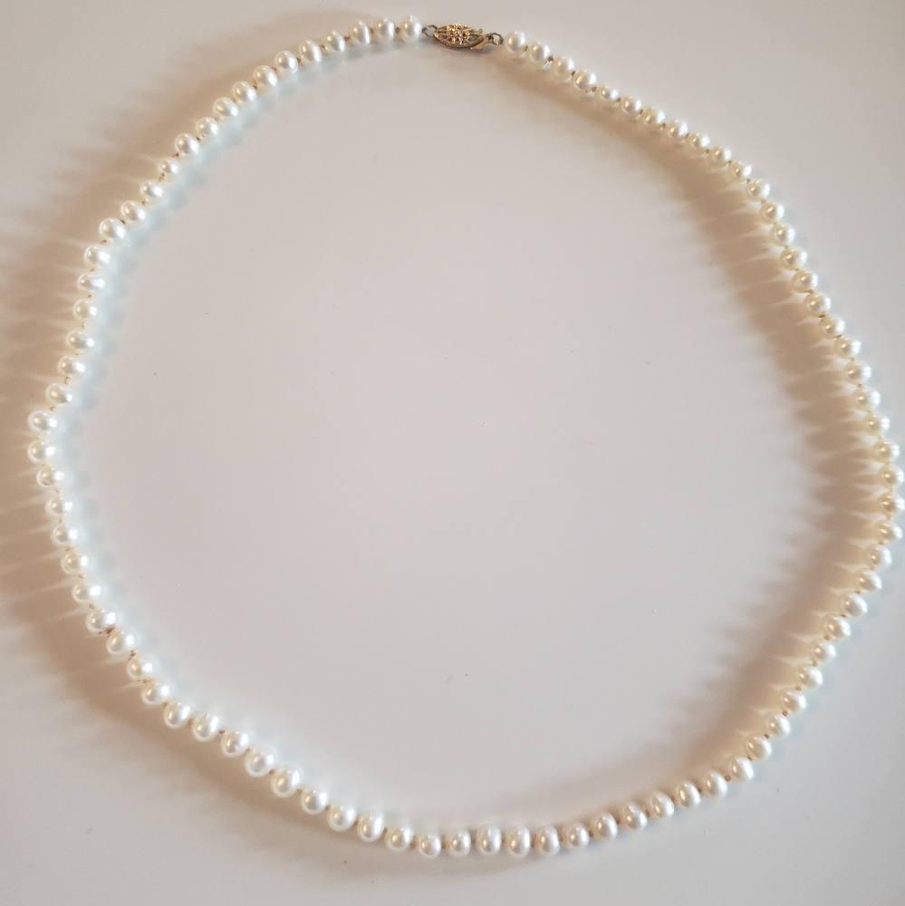 GSJ 18" strand of Pearls with 14kt Gold Clasp.    FF160